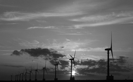 Eemshaven,Groningen, july 2016: Windturbines against sunset in Eemshavenのeditorial素材