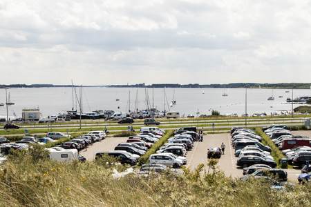 Veerse Meer,northsea beach august 2017: A large parking for tourism near the veerse meerのeditorial素材