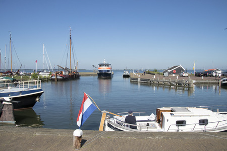 Netherlands,North Holland,Marken, june2016: the harbor is the busiest part of th villageのeditorial素材