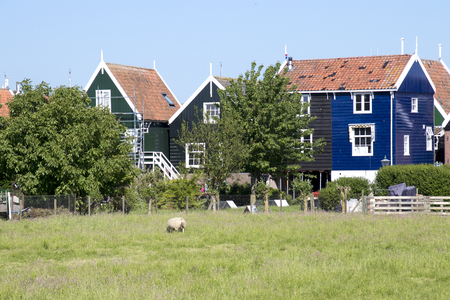 Netherlands,North Holland,Marken, june2016: Residential area on elevated ground, Yard calledのeditorial素材
