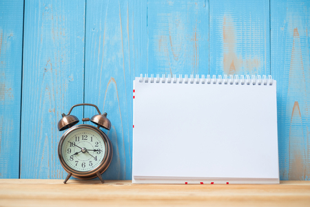 notebook and retro alarm clock  on table and copy space. Goals, Mission and New Start Conceptの写真素材