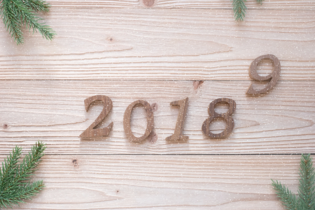 2018 - 2019 number with Christmas decorations on wooden background, Business Goals, Mission, Resolution, New Year New You conceptの写真素材