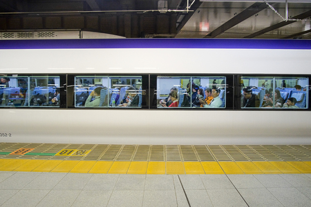 passenger in JR Chuo line Limited express bullet train line from Shinjuku station to Otsuki station ; Tokyo, JAPAN  9 April 2018のeditorial素材