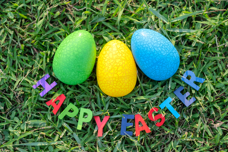 Happy Easter with Colorful Eggs cute bunny in the morning, Funny decoration in grass spring seasonの写真素材