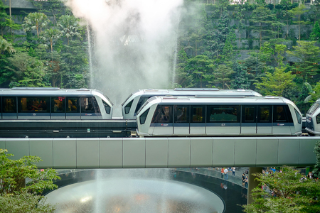 The Giant water fall HSBC Rain Vortex and beautiful green nature Shiseido Forest Valley in the Jewel...