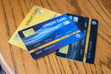 Close up credit card  for shopping. business, lifestyle,technology,ecommerce and online payment conceptの写真素材