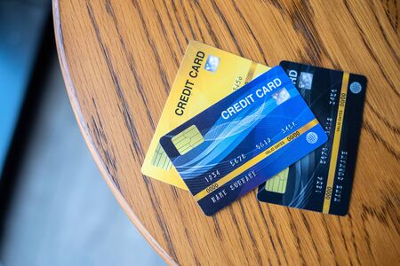 Close up credit card  for shopping. business, lifestyle,technology,ecommerce and online payment conceptの写真素材