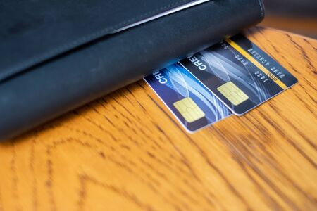 Close up credit card and wallet  for shopping. business, lifestyle,technology,ecommerce and online payment conceptの写真素材