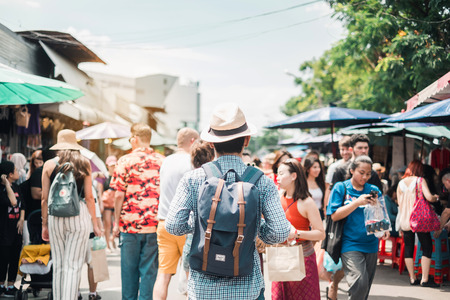 Asian traveler standing at Chatuchak Weekend Market, landmark and popular for tourist attractions in Bangkok; Bangkok, Thailand 15 June 2019のeditorial素材