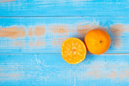 freshness Mandarin Oranges on wood table background, rich of Vitamin C and High Antioxidant. Organic Fruit and food Healthy conceptの写真素材