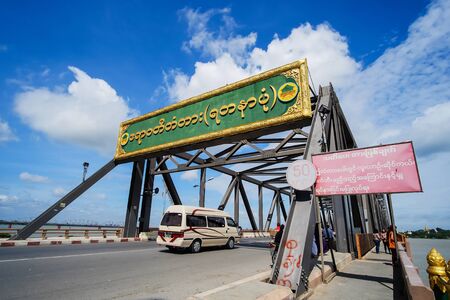 Transportation on Irrawaddy Bridge of Myanmar also Ayeyarwady, Yadanabon, Yadanar Pone or New Ava. crosses Irrawaddy River from Mandalay and Amarapura. Built in 2008, Mandalay, Myanmar, 11 August 2018のeditorial素材