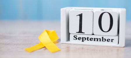 World Suicide prevention day ( 10 September), Yellow Ribbon for supporting people living and illness. Stop and Save Suicidal conceptの写真素材