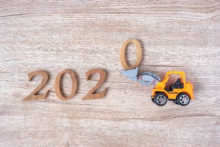 2020 Happy New year with miniature truck or construction vehicle. New Start, Vision, Resolution, goal, industrial, Warehouse conceptの写真素材