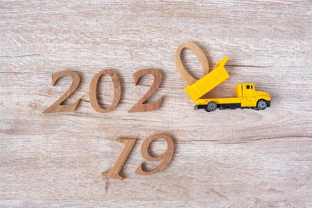 2020 Happy New year with miniature truck or construction vehicle. New Start, Vision, Resolution, goal, industrial, Warehouse conceptの写真素材
