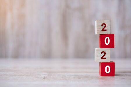 2020 wooden Blocks arrange on table background. Business, Risk Management, Resolution, strategy, goal, New Year New You and happy holiday conceptsの写真素材