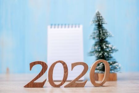 2020 New Year with blank notebook and wooden number. time for a New start, Goal, Resolution, Plan, Action and Mission Conceptの写真素材
