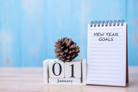 New Year goals word on notebook  and January calendar. time for a New start, resolution, Plan, Action and Mission Conceptの写真素材