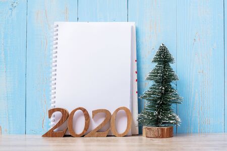 2020 New Year with blank notebook and wooden number. time for a New start, Goal, Resolution, Plan, Action and Mission Conceptの写真素材