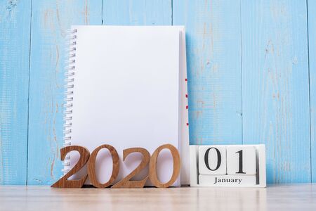 2020 Happy New Year with blank notebook and wooden number. time for a New Start, Resolution, goal, Plan, Action and Mission Conceptの写真素材