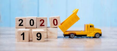2020 Happy New year with miniature truck or construction vehicle. New Start, Vision, Resolution, goal, industrial, Warehouse conceptの写真素材