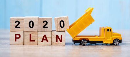 2020 Happy New year with miniature truck or construction vehicle. New Start, Vision, Resolution, goal, industrial, Warehouse conceptの写真素材