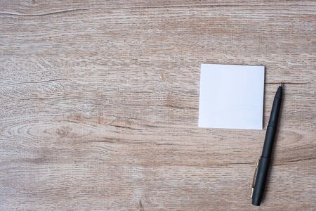 blank note with pen and on wooden table background. Strategy, mission, vision and Goal conceptの写真素材