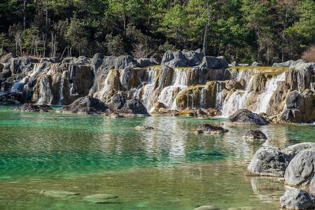 Beautiful of Blue Moon Valley, landmark and popular spot for tourists attractions inside the Jade Dragon Snow Mountain (Yulong) Scenic Area, near Lijiang Old Town. Lijiang, Yunnan, Chinaの写真素材