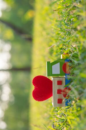 Red heart shape decoration on mini car. Love, Romantic and Happy Valentineâs day holiday conceptの写真素材