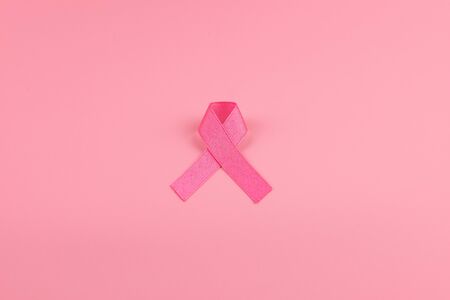 Breast Cancer Awareness month, Pink Ribbon supporting people living and illness. Healthcare, International Women day and World cancer day conceptの写真素材