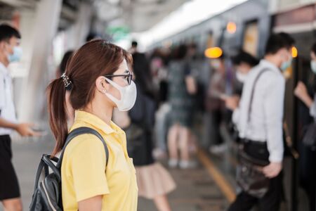 young Asian woman wearing protection mask.の写真素材