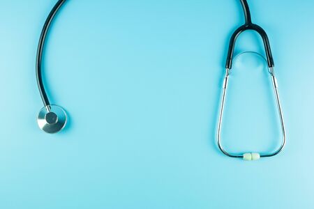 Top view Stethoscope on blue background with copy space for text. Healthcare, life Insurance, Health day, World Heart Day and Happy Doctor day conceptの写真素材