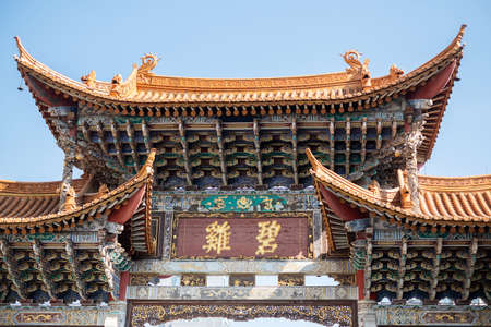 Jinbi square, golden Horse and Jade Rooster Archways. landmark and popular for tourists attractions in Kunming. Kunming, Yunnan, China. 10 December 2019のeditorial素材