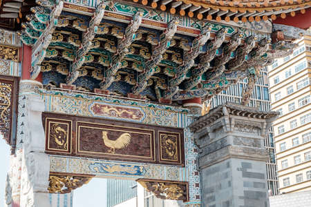 Jinbi square, golden Horse and Jade Rooster Archways. landmark and popular for tourists attractions in Kunming. Kunming, Yunnan, China. 10 December 2019のeditorial素材