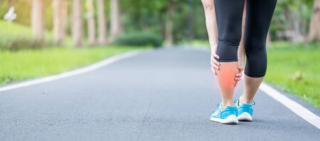 Young adult female with his muscle pain during running. runner woman having leg ache due to Calf...