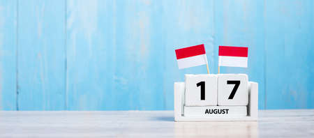 Wooden calendar of August 17th with miniature Indonesia flags. Indonesiaâ€™s independence day,...