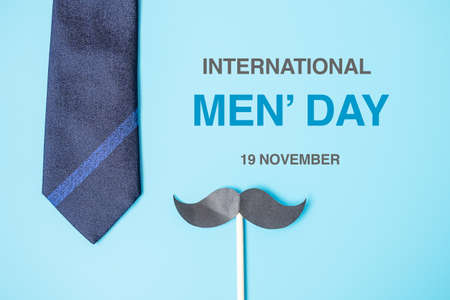 blue neckties and mustache on blue background. Happy Father's Day and International Men's Day conceptsの写真素材