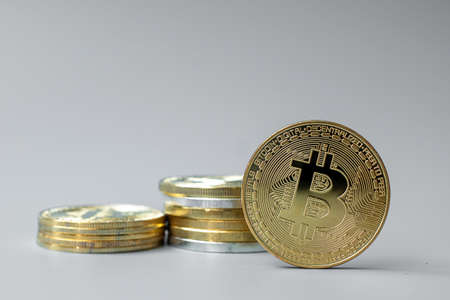 golden Bitcoin cryptocurrency coin stack, Crypto is Digital Money within the blockchain network, is...