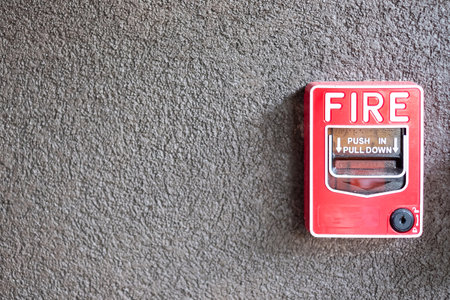 Fire alarm switch on the wall, powerful emergency equipment for industrial and residential