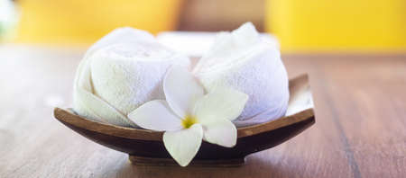 White cotton towel on table in the luxury hotel, welcome for guestsの写真素材