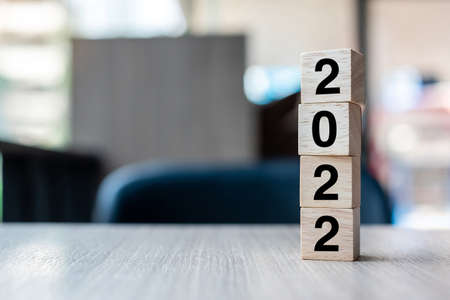 2022 wooden cube block on table background. Resolution, strategy, solution, goal, business and New Year New You and holiday conceptsの写真素材
