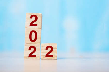 2022 wooden cube block on table background. Resolution, strategy, solution, goal, business and New Year New You and holiday conceptsの写真素材