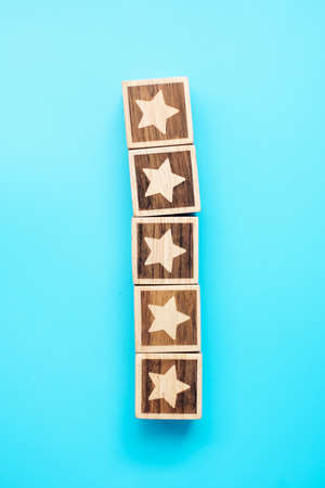 star symbol block on blue background. Service rating, ranking, customer review, satisfaction,...