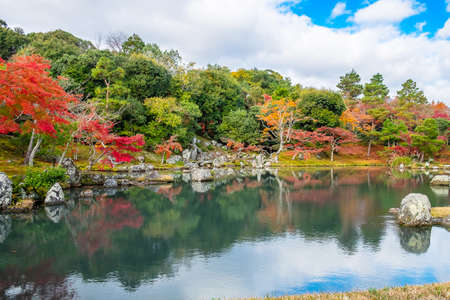 colorful leaves garden and pond inside Tenryuji temple, landmark and popular for tourists attractions in Arashiyama, Kyoto, Japan. Fall Autumn season, Vacation,holiday and Sightseeing conceptの写真素材