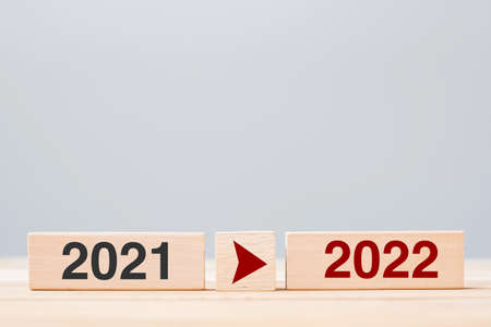 2021 and 2022 wooden block on table background. Resolution, strategy, countdown, goal, change and New Year holiday conceptsの写真素材