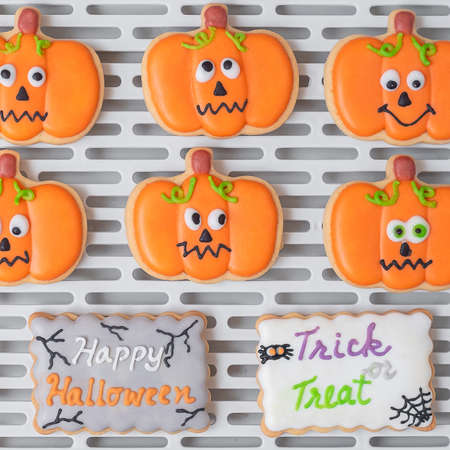 Halloween funny Cookies on tray. Trick or Threat, Happy Halloween, Hello October, fall autumn, Festive, party and holiday conceptの写真素材