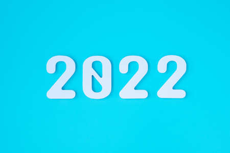 2022 white text number on blue background. Resolution, plan, review, goal, start and New Year holiday conceptsの写真素材