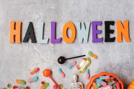 Happy Halloween day with ghost candies, pumpkin,  bowl and decorative. Trick or Threat, Hello October, fall autumn, Festive, party and holiday conceptの写真素材