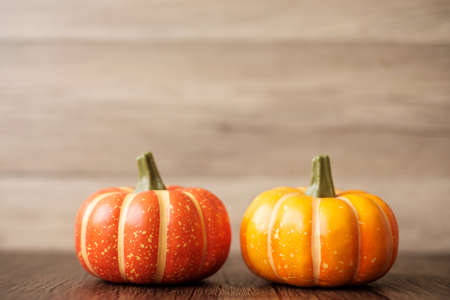 Orange pumpkin on table with copy space for banner background. Happy Halloween day, Hello October, fall autumn season, Festive, party and holiday conceptの写真素材