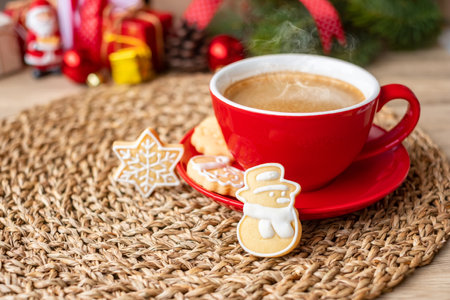 Merry Christmas with homemade cookies and coffee cup on wood table background. Xmas eve, party, holiday and happy New Year conceptの写真素材