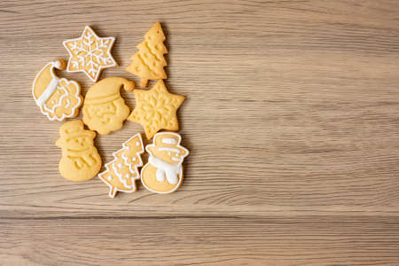 Merry Christmas with homemade cookies on wood table background. Xmas, party, holiday and happy New Year conceptの写真素材